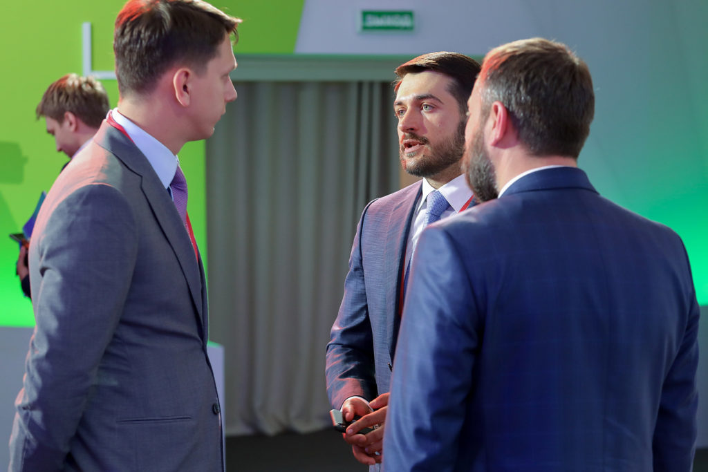 Business guests talking during an event break